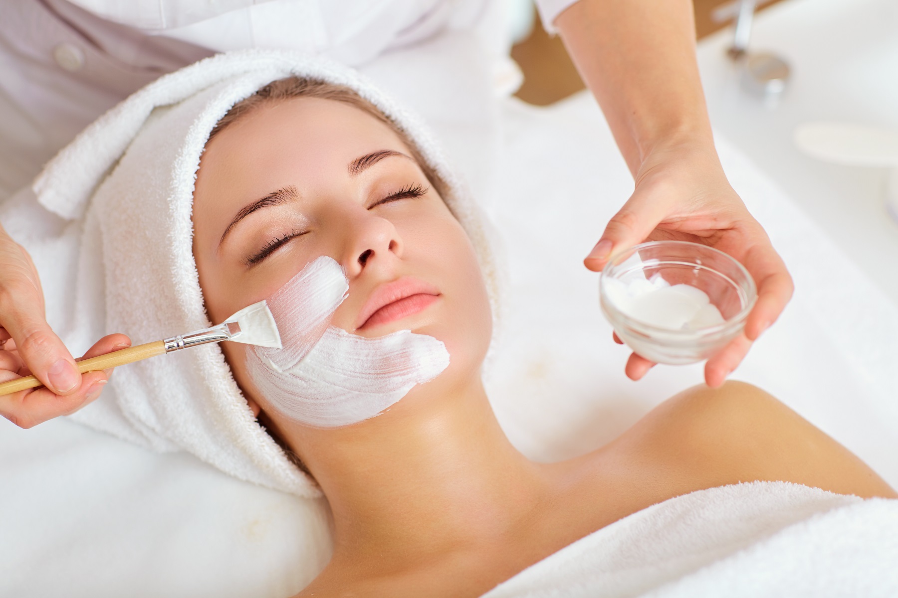 Woman in mask on face in spa beauty salon. | Soleill Medical & Beauty Spa in Portland, OR